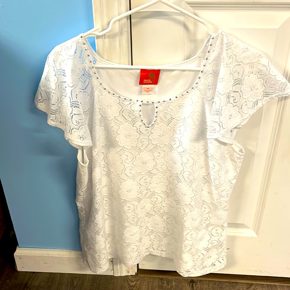 White top with silver beading around neck. Shear sleeves, great condition